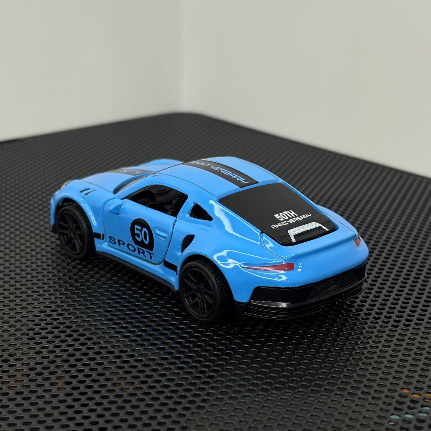 Porsche Blue Graphic Metal Body 1:43