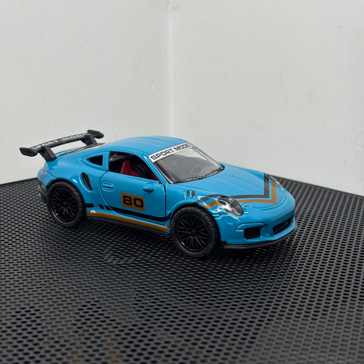 Porsche 911 Blue GT RS Diecast Sports Car Toy – 1:36 Scale with Gold Stripes, Metal Body & Pullback Action