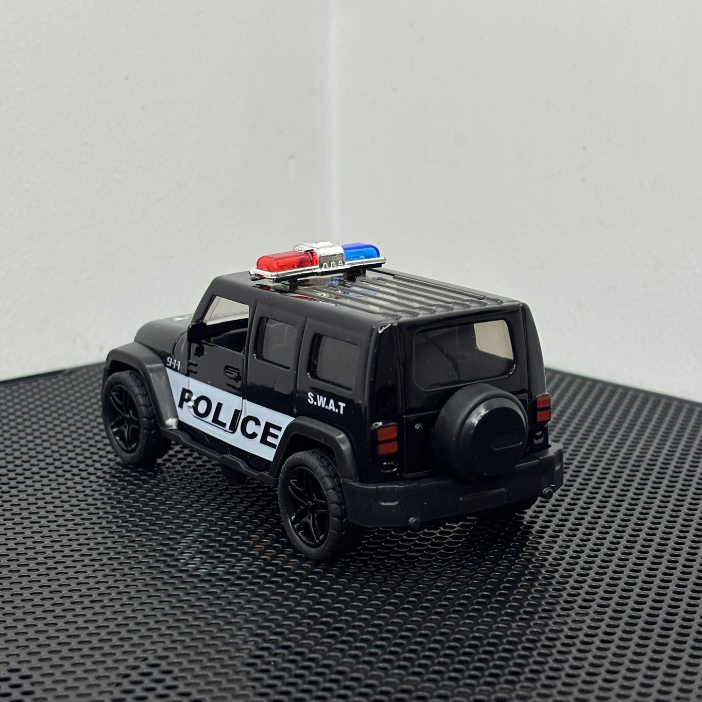 Black SWAT Police Jeep Diecast Metal Toy – 1:43 Scale with Pullback Action